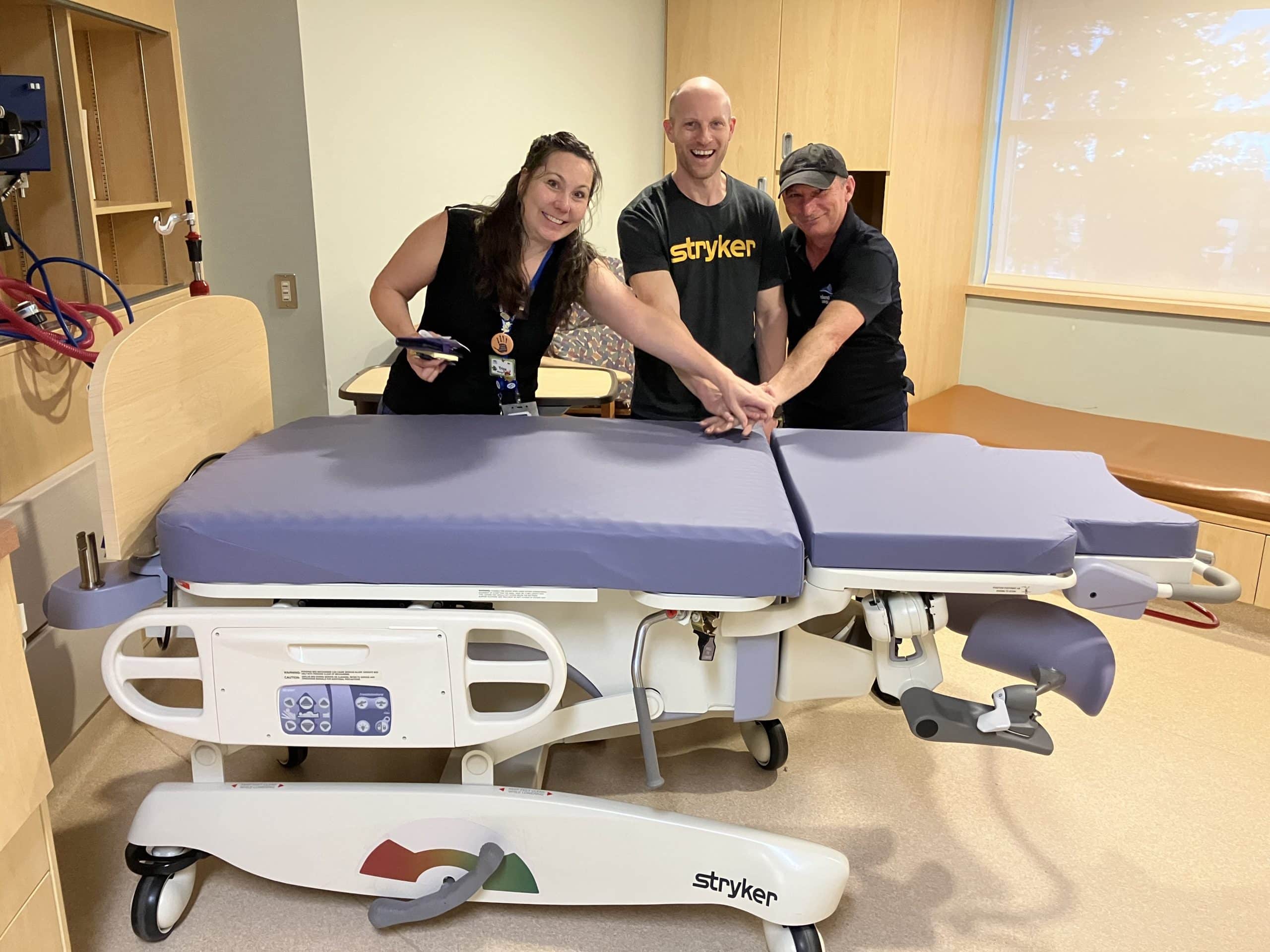 Photographed- Manager of NRGH Perinatal Unit, Trina Knight, with a new birthing bed. 
These birthing beds were ordered the week after Soirée by the Sea and were delivered 5 months later.